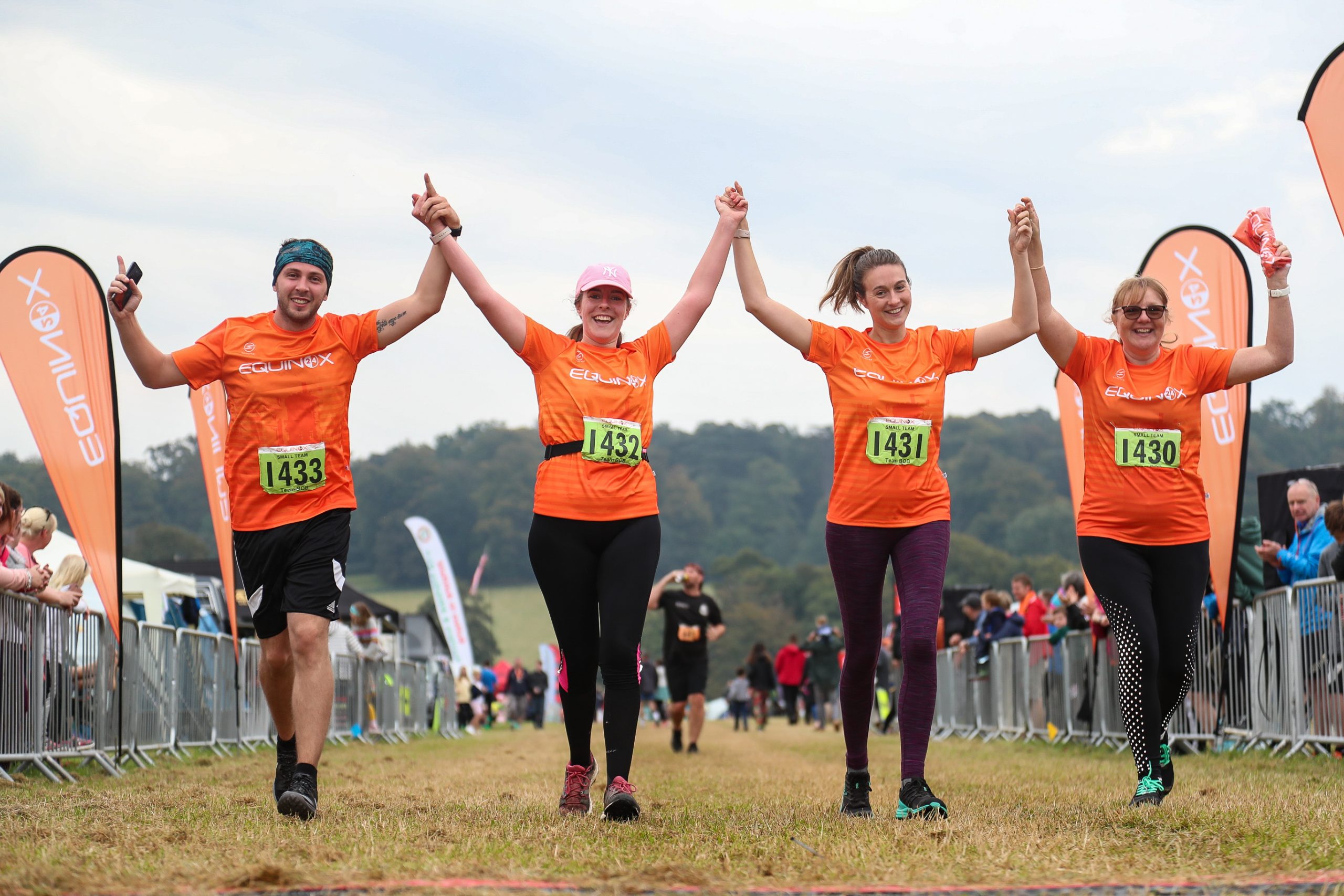 Team runners crossing line Team runners crossing line